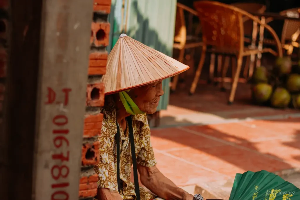 Vietnamese woman wearing a traditional hat